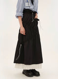 プリーツパネルロングスリムミディアム丈スカート