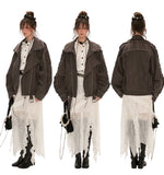 Distressed denim jacket and short skirt