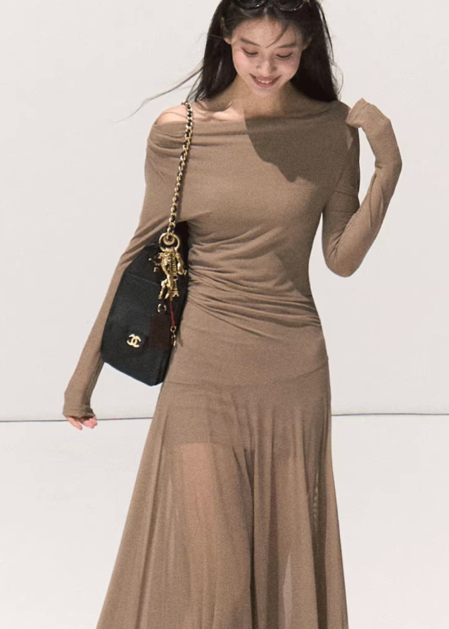 korean off shoulder long dress, minimalist chiffon long dress women, sheer mesh off shoulder gown, korean modern elegant long sleeve dress, soft beige off shoulder slim dress, seoul feminine sheer outfit, korean street fashion evening dress, high waist slim fit long dress, kfashion autumn soft mesh dress, korean aesthetic romantic gown, off shoulder elegant maxi dress, korean poetic minimalism fashion, flowy long dress seoul style, feminine waist wrap dress, neutral tone chiffon gown women