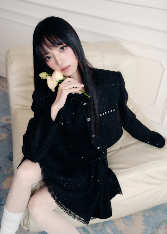 A constellation of refinement — the Noir Étoile Ensemble merges classic Parisian tailoring with Fragileheart’s pastel-noir sensuality. The cropped glitter tweed jacket and sculpted mini dress shimmer with quiet confidence, revealing both softness and strength. Perfect for evenings when sophistication meets modern rebellion.