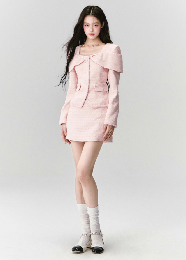Fragileheart tweed set, pink bow jacket, luxury Korean fashion, elegant two-piece outfit, pastel tweed suit, quiet luxury womenswear, soft pink ensemble, French small fragrance style, K-fashion 2025, feminine office outfit, luxury tweed mini skirt set, romantic pastel look, modern elegant fashion, couture-inspired outfit
