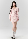 Fragileheart tweed set, pink bow jacket, luxury Korean fashion, elegant two-piece outfit, pastel tweed suit, quiet luxury womenswear, soft pink ensemble, French small fragrance style, K-fashion 2025, feminine office outfit, luxury tweed mini skirt set, romantic pastel look, modern elegant fashion, couture-inspired outfit
