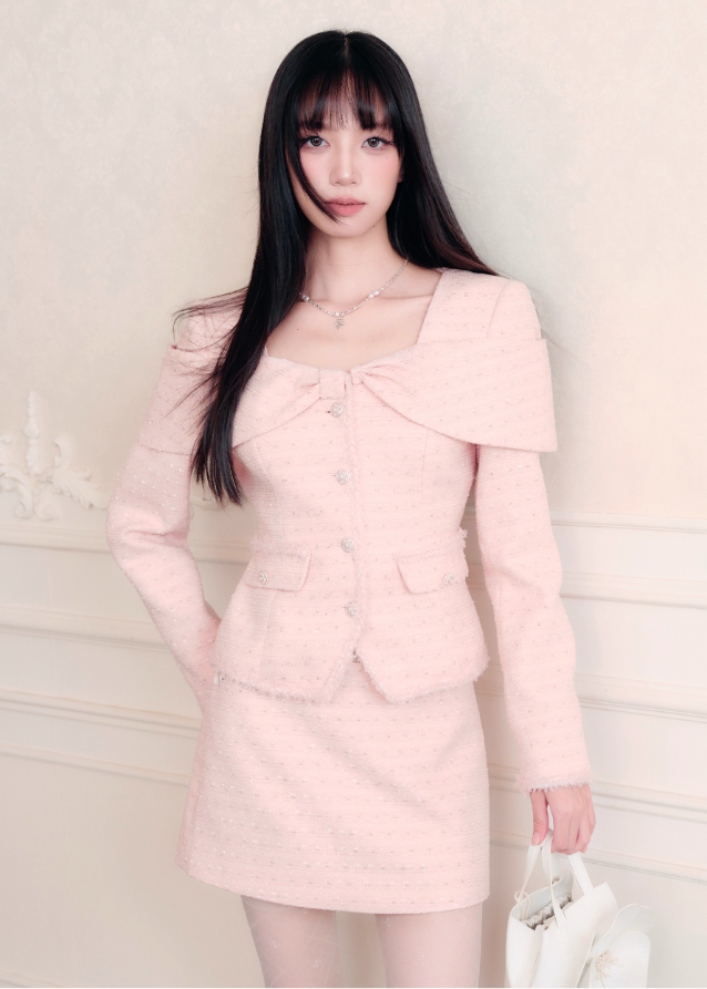 Fragileheart tweed set, pink bow jacket, luxury Korean fashion, elegant two-piece outfit, pastel tweed suit, quiet luxury womenswear, soft pink ensemble, French small fragrance style, K-fashion 2025, feminine office outfit, luxury tweed mini skirt set, romantic pastel look, modern elegant fashion, couture-inspired outfit