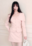 Fragileheart tweed set, pink bow jacket, luxury Korean fashion, elegant two-piece outfit, pastel tweed suit, quiet luxury womenswear, soft pink ensemble, French small fragrance style, K-fashion 2025, feminine office outfit, luxury tweed mini skirt set, romantic pastel look, modern elegant fashion, couture-inspired outfit