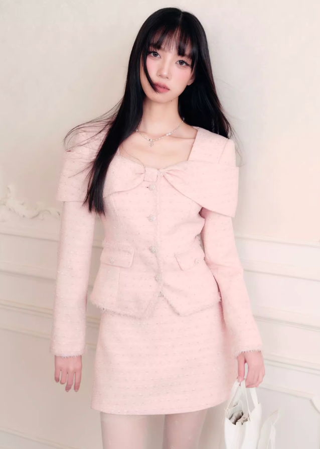 Fragileheart tweed set, pink bow jacket, luxury Korean fashion, elegant two-piece outfit, pastel tweed suit, quiet luxury womenswear, soft pink ensemble, French small fragrance style, K-fashion 2025, feminine office outfit, luxury tweed mini skirt set, romantic pastel look, modern elegant fashion, couture-inspired outfit