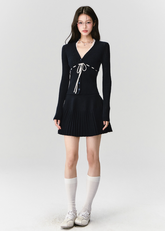 Fragileheart knit skirt set, black pleated two-piece, luxury Korean fashion, elegant autumn outfit, quiet luxury womenswear, pastel noir aesthetic, V-neck cardigan set, modern feminine K-fashion, minimalist ribbed knit, poetic fashion 2025, romantic fall outfit, delicate Korean style, sophisticated knitwear set, graceful pleated skirt look