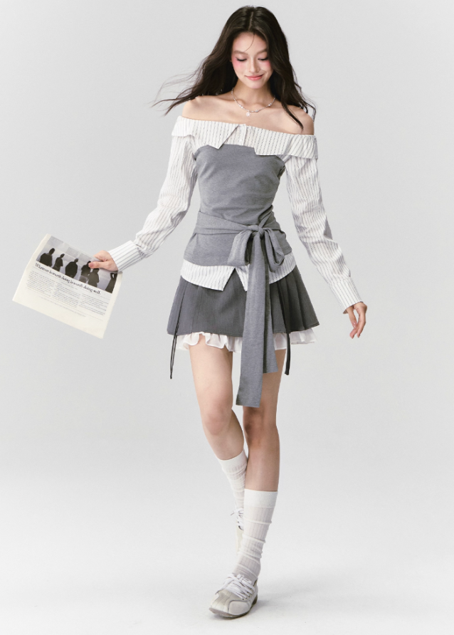 Fragileheart off-shoulder blouse, grey patchwork top, asymmetric layered shirt, luxury Korean fashion, elegant autumn outfit, quiet luxury style, pastel noir aesthetic, K-fashion 2025, structured feminine top, intellectual modern look, pre-fall womenswear, romantic Korean blouse, soft grey knit shirt, delicate tailored outfit