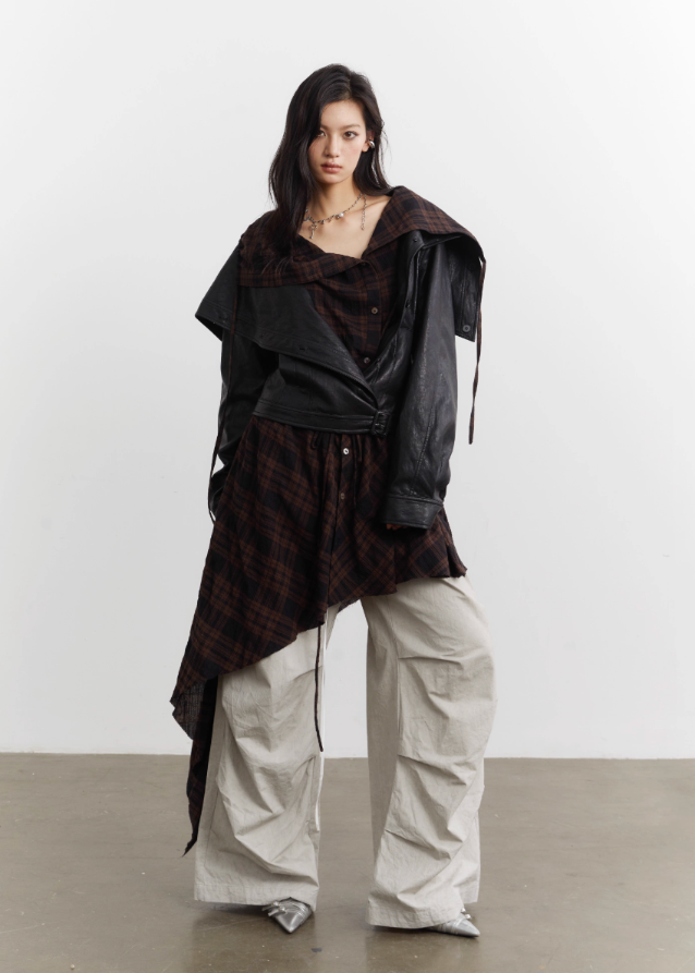 urban nomad jacket set, korean street style jacket, korean fashion leather jacket, plaid apron overlay jacket, asymmetrical plaid apron skirt, PU faux leather jacket women, K-fashion outerwear 2025, edgy layered jacket outfit, korean mixed media jacket, streetwear leather jacket set, plaid drape apron piece, avant garde jacket women, deconstructed jacket womenswear, runway style layered jacket, korean edgy fashion set