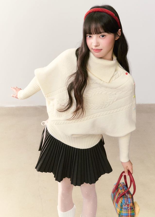 umoumo knit top, Korean style sweater, feminine knitwear, asymmetrical lapel sweater, cape style sweater, cable knit pullover, off-white cable sweater, colorful button sweater, winter Korean fashion, soft girl aesthetic knit, oversized feminine sweater, cozy winter top, girly Korean knitwear, cute cape sweater, asym knit design