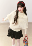 umoumo knit top, Korean style sweater, feminine knitwear, asymmetrical lapel sweater, cape style sweater, cable knit pullover, off-white cable sweater, colorful button sweater, winter Korean fashion, soft girl aesthetic knit, oversized feminine sweater, cozy winter top, girly Korean knitwear, cute cape sweater, asym knit design