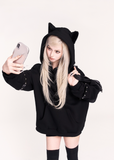 black cat ear hoodie, gothic cat hoodie, VOCK dark streetwear, oversized plush hooded sweatshirt, punk kawaii cat ear top, oversized black hoodie girl, dark cute street style, goth plush hoodie, edgy oversized sweatshirt, cat ear streetcore hoodie, VOCK aesthetic clothing, unisex gothic hoodie, Japanese dark cute fashion, black lazy hoodie, gothic girl oversized top, punk cat ear fashion, warm plush black hoodie, darkwear hoodie girl