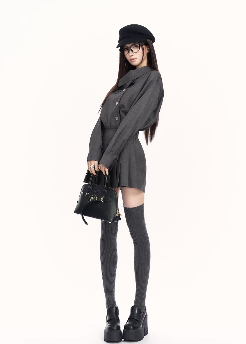 trench style mini dress women, pleated waist dress, british college dress women, edgy commuter dress, lapel mini dress women, dark minimalist fashion dress, vock dress style, tailored spring dress women, urban preppy dress, waist shaping mini dress, alternative office wear women, structured pleated dress, modern black gray dress, controlled silhouette fashion, early spring women dress