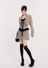 two piece blazer dress women, lace panel mini dress, cropped blazer set women, edgy tailored outfit, vock two piece set, waist defining mini dress, dark minimalist fashion women, structured blazer mini dress, alternative fashion set women, modern street tailoring, controlled silhouette clothing, edgy spring outfit women, contrast texture dress set, statement women suit set, urban luxury womenswear