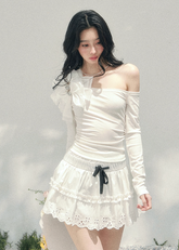 off shoulder long sleeve top women, bow detail spring top, slim fit t shirt women, aomalm top style, feminine spring outfit women, elegant off shoulder tee, refined casual women top, korean french style clothing, lightweight spring top women, shoulder revealing top women, modern women long sleeve tee, delicate bow top, understated luxury spring wear, hot girl spring top, versatile women fashion top