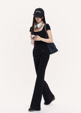 VOCK flared trousers set women, urban studded knit top, minimalist low rise flare pants, Korean street luxury outfit, cold urban aesthetic womenswear, sleek monochrome streetwear set, modern Seoul street style trousers, structured slim fit knit top, VOCK power dressing outfit, architectural silhouette streetwear, edgy minimalist flare pants women, urban fitted T-shirt set, clean line street fashion ensemble