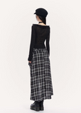 VOCK plaid maxi skirt women, urban asymmetric long skirt, minimalist black white check skirt, Korean street luxury maxi skirt, cold urban aesthetic womenswear, architectural curved hem skirt, modern Seoul street style plaid skirt, integrated shorts long skirt women, VOCK structured silhouette skirt, edgy monochrome streetwear skirt, power dressing plaid maxi outfit