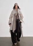 JNYLON detachable cape trench coat women, Korean stylish linen trench coat, modern Korean fashion long coat, chic natural style outerwear women, trendy Korean street chic trench, plaster white irregular trench coat, oversized linen blend coat Korean style, urban fashion layered trench women, stylish Korean aesthetic long coat, fashionable natural tone trench coat