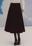 black midi skirt, pleated skirt women, a line midi skirt, umbrella skirt, elegant black skirt, korean fashion skirt, french style midi skirt, high waist skirt, minimalist skirt women, spring midi skirt, flowy skirt outfit, versatile black skirt, classic midi skirt, feminine silhouette skirt, chic pleated skirt, everyday elegant wear, parisian style clothing, soft structured skirt, refined women fashion, timeless wardrobe essential