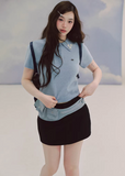 polo knit top women, embroidered sweater top, short sleeve knit, korean fashion top, fitted polo shirt women, spring knitwear, waist slimming top, elegant casual top, soft knit blouse, minimalist polo top, feminine knitwear, everyday chic outfit, blue knit top women, refined casual wear, lightweight sweater top, modern feminine clothing, versatile spring top, tailored knit shirt, aesthetic fashion top, parisian casual style