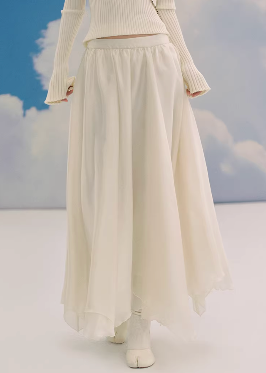 sheer maxi skirt, chiffon skirt women, irregular hem skirt, korean fashion skirt, flowy long skirt, a line maxi skirt, elastic waist skirt, feminine chiffon skirt, spring long skirt, elegant ivory skirt, layered sheer skirt, romantic outfit skirt, soft aesthetic fashion, lightweight summer skirt, parisian style skirt, modern feminine clothing, versatile long skirt, airy fabric skirt, graceful movement skirt, refined casual elegance