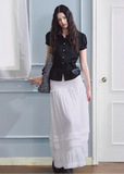 white maxi skirt, pleated long skirt, korean fashion skirt, flowy maxi skirt, elastic waist skirt, feminine long skirt, spring summer skirt, lightweight skirt women, elegant casual outfit, parisian style clothing, soft aesthetic skirt, tiered maxi skirt, breathable fabric skirt, modern feminine clothing, versatile long skirt, chic everyday outfit, refined casual wear, airy fabric skirt, graceful silhouette skirt, minimal elegant skirt