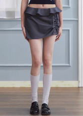 ruffled mini skirt women, low rise skirt, shirred mini skirt, korean fashion skirt, hip hugging skirt, spring outfit ideas, feminine mini skirt, casual chic skirt, aesthetic fashion skirt, modern feminine clothing, versatile mini skirt, lightweight skirt women, stylish short skirt, parisian style clothing, refined casual wear, body contour skirt, clean silhouette skirt, trendy mini skirt, everyday outfit skirt, spring mini skirt