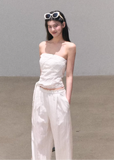 bandeau set women, linen two piece outfit, korean fashion set, spring outfit ideas, casual spring outfits, resort outfit women, wide leg pants set, minimalist summer outfit, breathable fabric set, soft aesthetic outfit, modern feminine clothing, parisian style clothing, versatile two piece outfit, travel outfit women, relaxed fit pants women, chic everyday set, natural fabric outfit, calm luxury fashion, effortless style set, spring wardrobe set