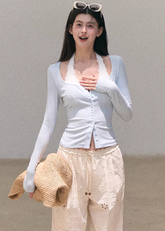 ribbed cardigan women, u neck knit top, korean fashion cardigan, spring outfit ideas, casual spring outfits, slim fit cardigan women, lightweight knitwear, button cardigan top, soft aesthetic outfit, modern feminine clothing, parisian style clothing, versatile layering top, chic everyday outfit, calm luxury fashion, breathable knit top, effortless style cardigan, refined casual wear, spring wardrobe essential, minimal knit top, fitted cardigan women