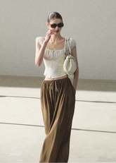 puff sleeve top women, slim fit t shirt women, korean fashion top, minimal outfit women, effortless outfit ideas, casual summer outfits, short sleeve blouse women, modern feminine clothing, parisian style clothing, versatile everyday top, chic casual outfit, calm luxury fashion, breathable summer top, fitted tee women, simple basic top, clean silhouette top, everyday essential top, refined casual wear, lightweight summer top, minimalist fashion top