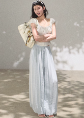 silk pants women, wide leg trousers women, korean fashion pants, minimal outfit women, effortless outfit ideas, casual summer outfits, mulberry silk pants, modern feminine clothing, parisian style clothing, versatile wide pants, chic everyday outfit, calm luxury fashion, breathable summer pants, relaxed fit trousers women, natural fabric clothing, elegant casual pants, summer wardrobe bottoms, lightweight silk trousers, clean silhouette pants, simple elegant outfit