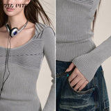 スリムフィットデザインのラージラペルウールセーター