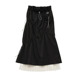 プリーツパネルロングスリムミディアム丈スカート