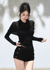 Black slim-fit polo knit top with asymmetric foldover shoulder design