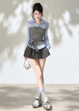 Vintage-inspired striped long sleeve top with waist-defining knit detail