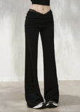 Grey lace-trim flare pants with ruched fold-over waistband