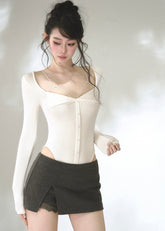 White strappy sweetheart neck knit top with lace trim and long sleeves