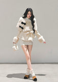 winter three piece set, fur cloak suit women, luxury holiday outfit, bow coat winter, white fur trim set, christmas light luxury clothing, winter shorts set, korean winter fashion suit, elegant fur cape outfit, fw25 womens coat set