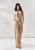 cargo jumpsuit women, strapless jumpsuit women, bandeau jumpsuit, utility jumpsuit women, wide leg jumpsuit women, summer jumpsuit outfit women, beige jumpsuit women, modern minimal outfit women, street style jumpsuit women, fashion forward jumpsuit, elevated casual outfit women, one piece outfit women, trendy cargo outfit women, chic summer jumpsuit, stylish utility outfit