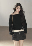 Black asymmetric off-shoulder cable knit sweater with long sleeves
