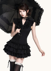 Tiered ruffle black dress with a waist-defining silhouette