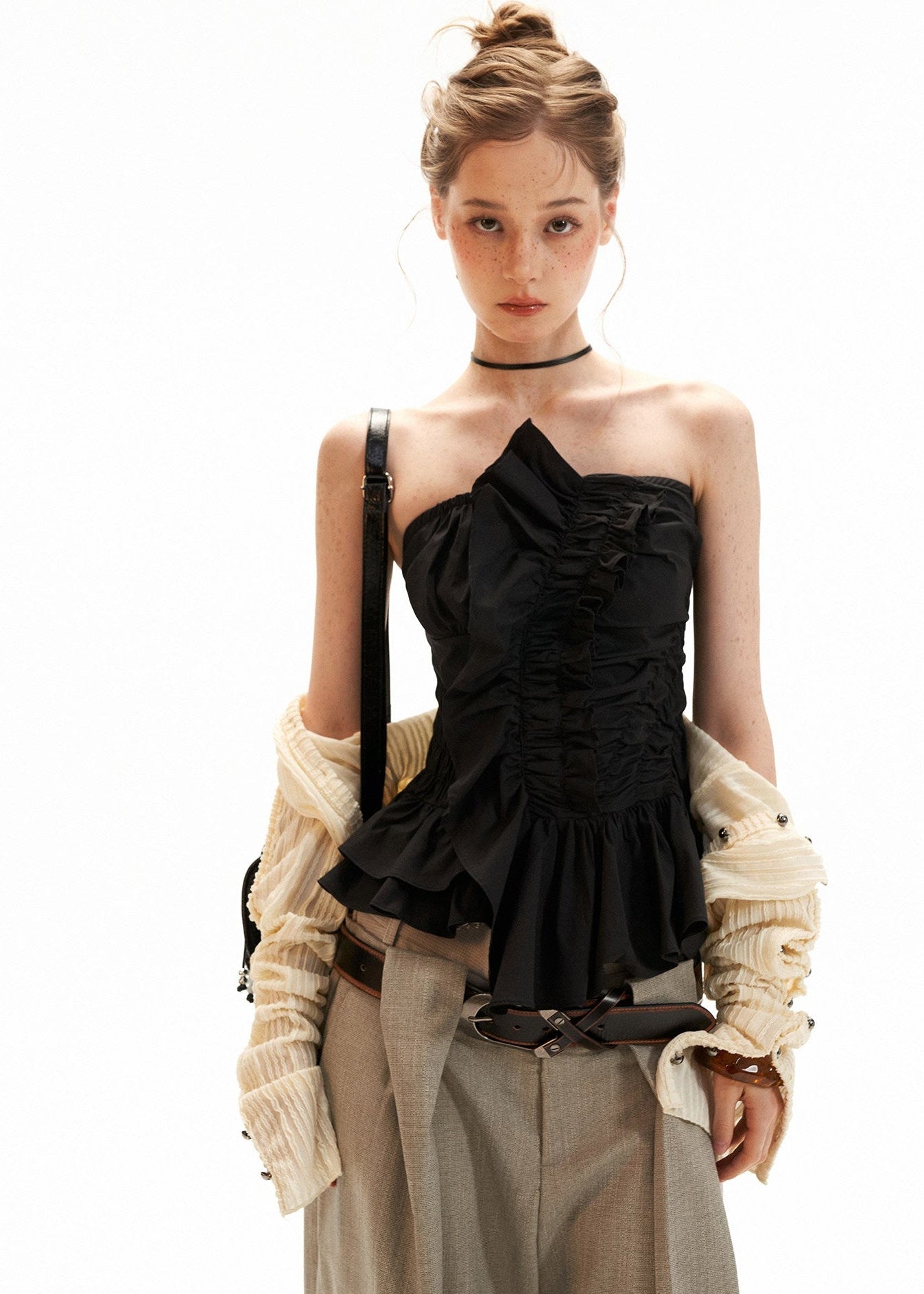 Back view of a smocked grey bandeau top