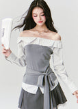 Fragileheart off-shoulder blouse, grey patchwork top, asymmetric layered shirt, luxury Korean fashion, elegant autumn outfit, quiet luxury style, pastel noir aesthetic, K-fashion 2025, structured feminine top, intellectual modern look, pre-fall womenswear, romantic Korean blouse, soft grey knit shirt, delicate tailored outfit