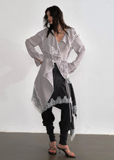 JNYLON asymmetric long shirt women, Korean stylish lace stripe blouse, modern Korean fashion long shirt, chic ruffle stripe layering piece, vintage inspired lace long blouse, trendy Korean street chic outfit, lightweight striped long shirt women, urban Korean fashion layering top, stylish oversized long blouse Korean style, lace applique long shirt women