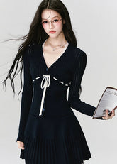 Fragileheart knit skirt set, black pleated two-piece, luxury Korean fashion, elegant autumn outfit, quiet luxury womenswear, pastel noir aesthetic, V-neck cardigan set, modern feminine K-fashion, minimalist ribbed knit, poetic fashion 2025, romantic fall outfit, delicate Korean style, sophisticated knitwear set, graceful pleated skirt look