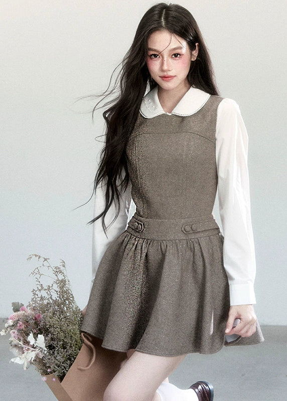 Fragileheart vest dress set, doll collar blouse, luxury Korean fashion, elegant autumn outfit, quiet luxury womenswear, pastel noir aesthetic, preppy Korean fashion, taupe layered dress, K-fashion 2025, modern feminine look, romantic school style, soft brown dress outfit, delicate preppy outfit, refined fall fashion