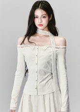 Ethereal and composed, the White Moonlight Sonata Set embodies Fragileheart’s quiet-luxury vision. The off-shoulder lace top and embroidered skirt whisper of moonlit evenings and polished confidence. Soft satin sheen meets delicate tailoring, creating a timeless silhouette that speaks of grace without needing attention.