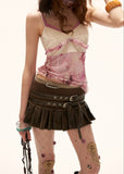summer 2026 outfits, summer outfit ideas, vacation outfit women, casual summer outfits women, festival outfit women, vintage mini skirt, low waist skirt women, belted mini skirt, pleated mini skirt women, American vintage skirt, distressed skirt women, retro summer outfit, edgy summer skirt, festival summer fashion, vacation mini skirt