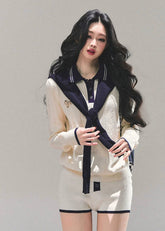 AOMALM knit set, AOMALM morning mist knit, Korean preppy knit outfit, cream navy knit two piece, varsity knit short set, autumn winter knit co ord, soft girl Korean fashion, long sleeve knit top and shorts, K fashion loungewear set, cozy college style outfit, feminine Korean knitwear, Seoul street preppy style, Korean knit shorts set, cute knit two piece for winter, soft knit polo top