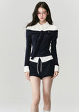 Fragileheart knit top set, off-shoulder sweater, luxury Korean fashion, elegant preppy outfit, autumn winter 2025, quiet luxury style, pastel noir aesthetic, black and white knitwear, K-fashion two-piece set, modern feminine look, ribbon detail top, soft academic chic, refined Korean womenswear, structured luxury knit