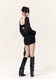 Black backless mini dress set with sheer long sleeves and crossed back straps